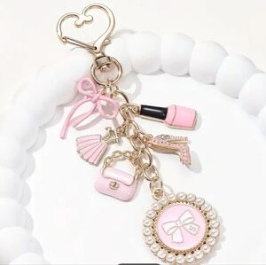 Charming Pink and Gold Keychain with Bow and Accessories